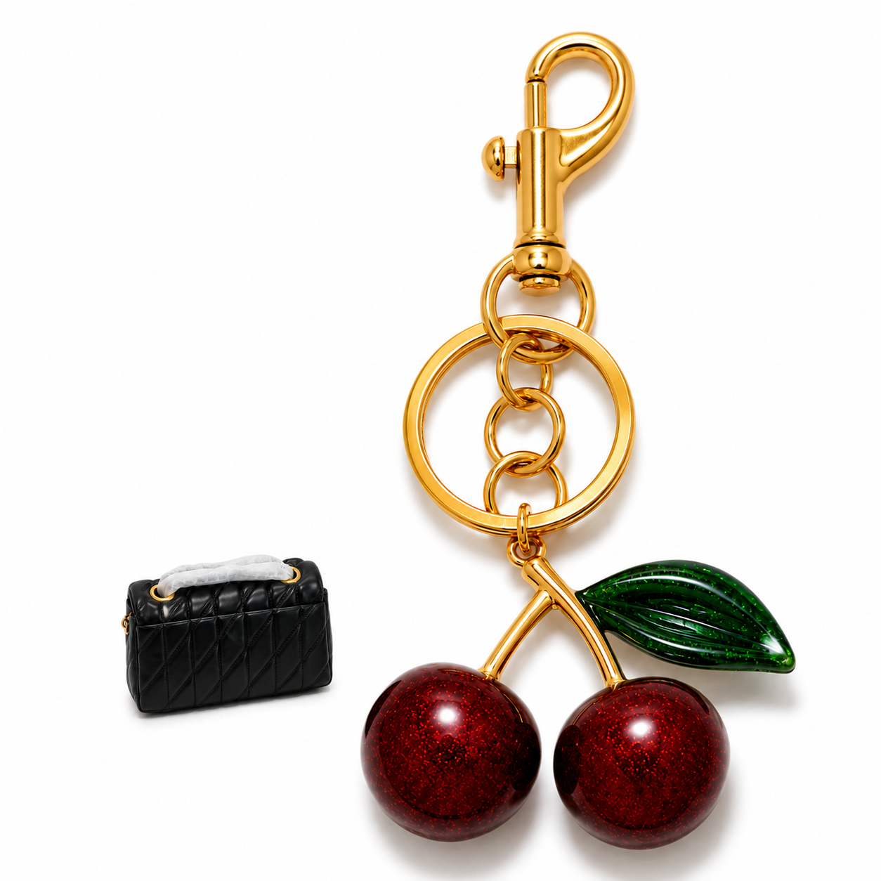 Black handbag and cherry charm